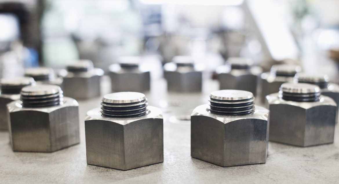 CNC-machined lock nuts featured on heavy machinery