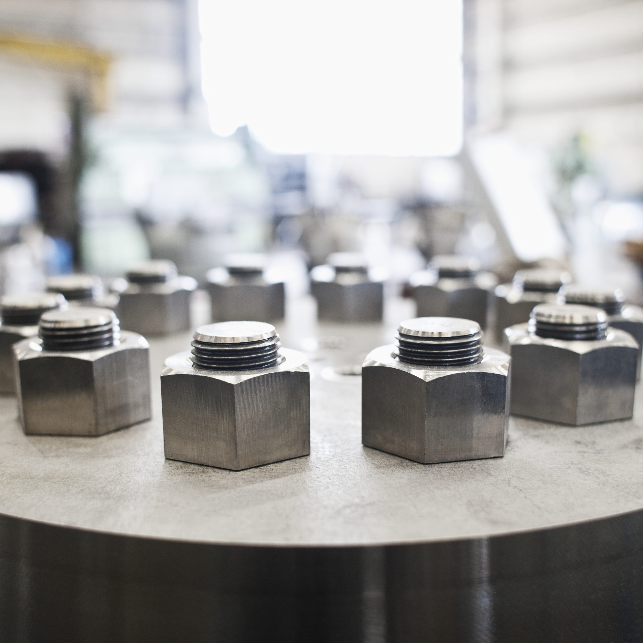 CNC-machined lock nuts featured on heavy machinery